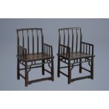 A pair of Chinese lacquered wooden chairs, first half of the 20th C.