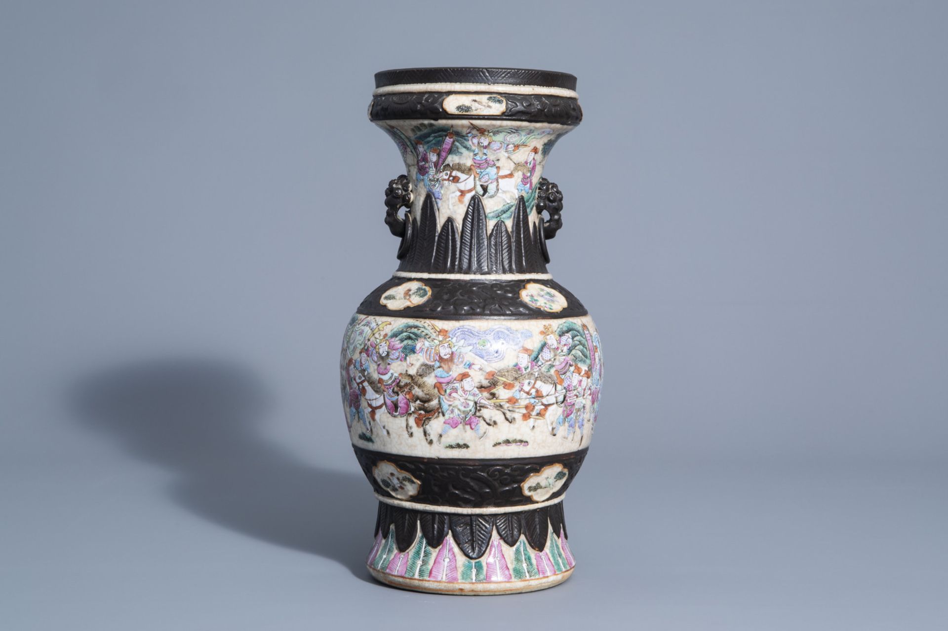 A Chinese Nanking crackle glazed famille rose 'warrior' vase, 19th C.