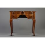 An English cherrywood ladies writing desk, 18th C.