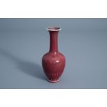 A Chinese monochrome sang de boeuf glazed vase, Kangxi mark, 19th/20th C.