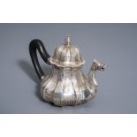 A refined Baroque silver teapot and cover with ebony handle, Ghent, Belgium, probably 19th C.