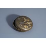 A Japanese mixed metal box and cover with inscription on the base, Meiji, 19th C.