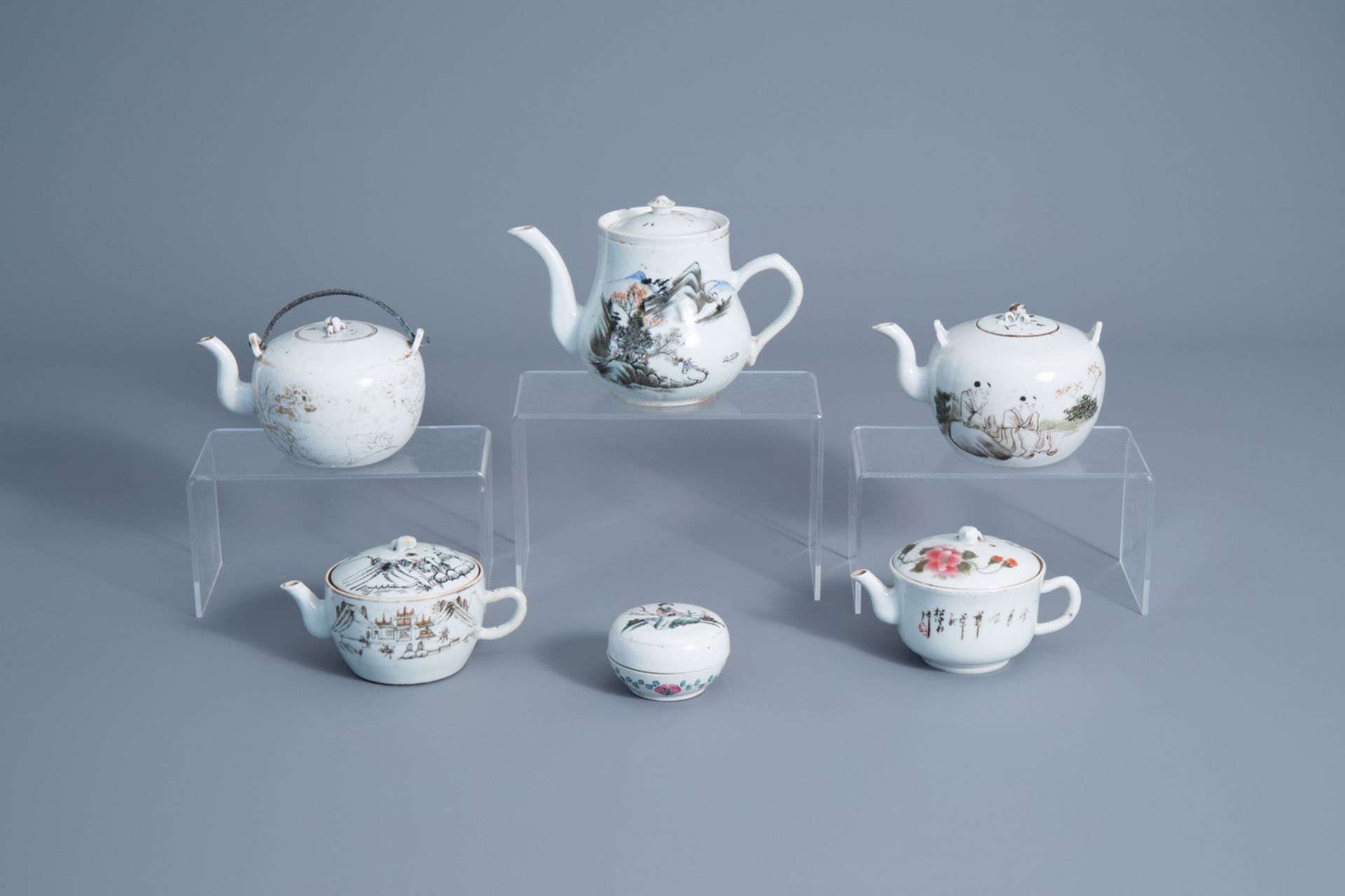 Five Chinese qianjiang cai teapots and covers and a seal paste box, 19th/20th C.