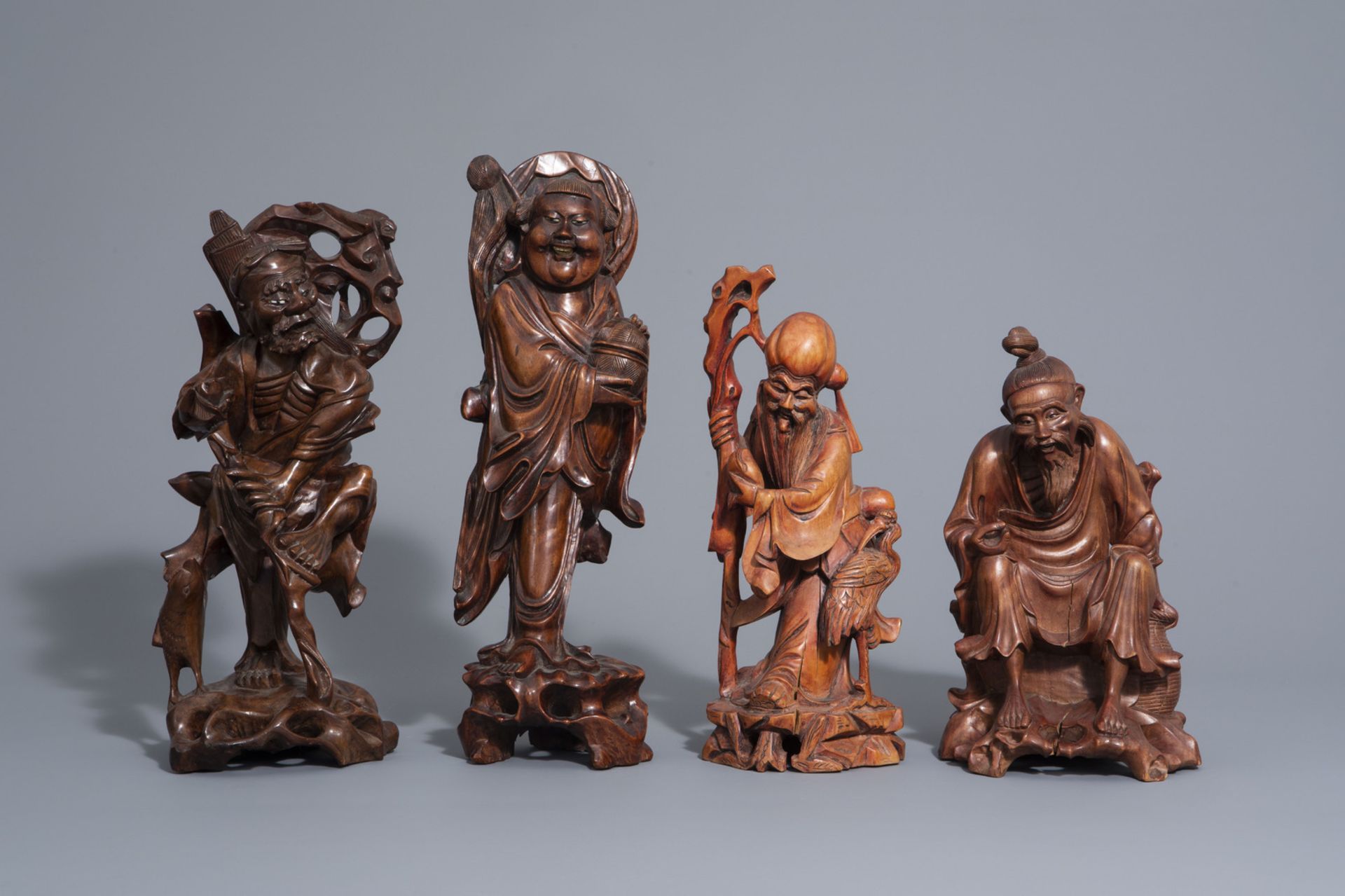 A collection of nine Chinese wooden figures, 19th/20th C. - Bild 2 aus 15
