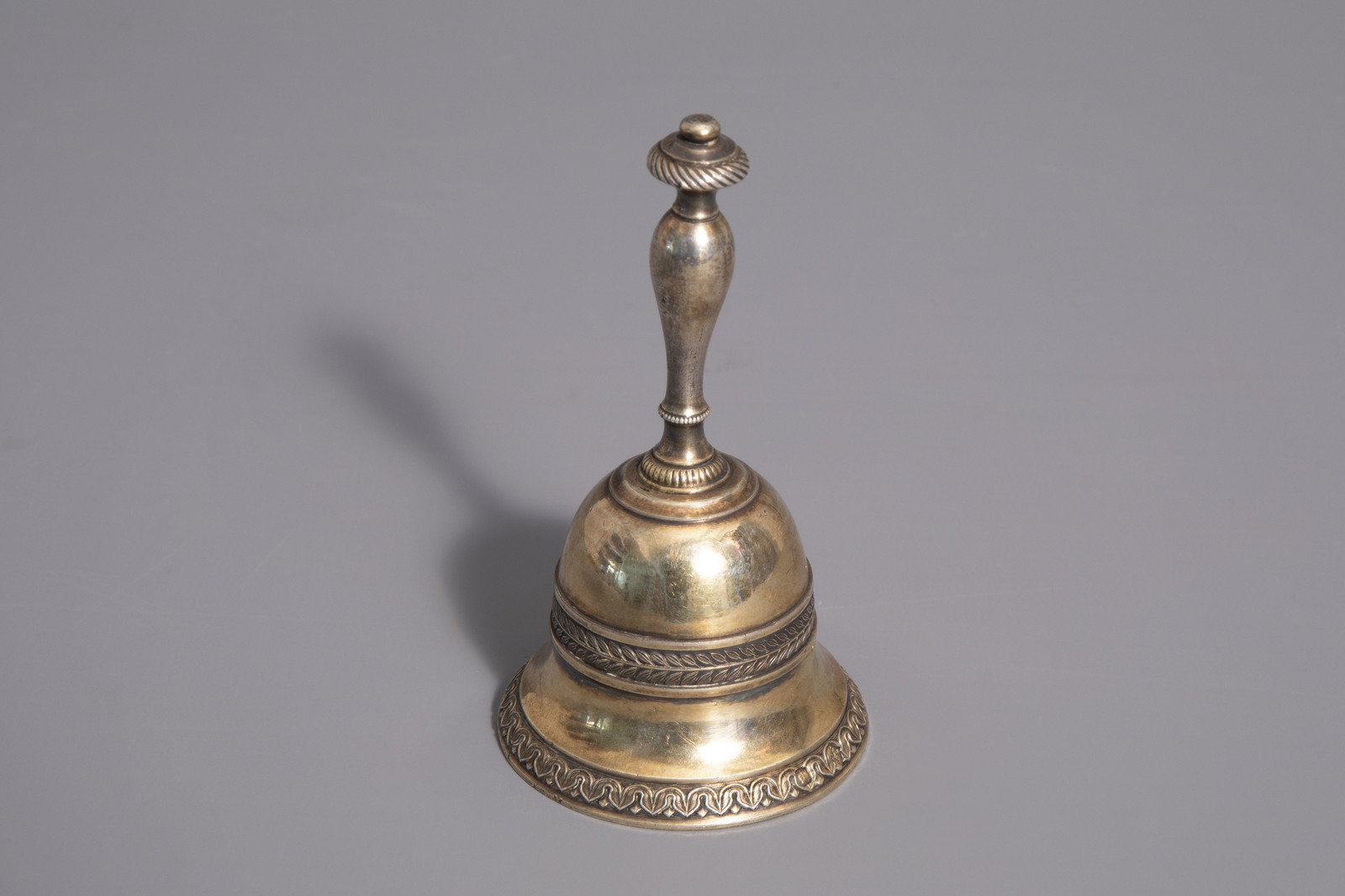 A gilt silver tabel bell, various marks, 19th/20th C.