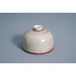 A Chinese 'peach bloom' glazed brush washer, Kangxi mark, 19th/20th C.