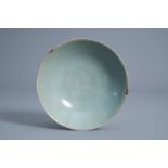 A Korean celadon bowl with incised design, probably Goryeo/Joseon, 14th/15th C.
