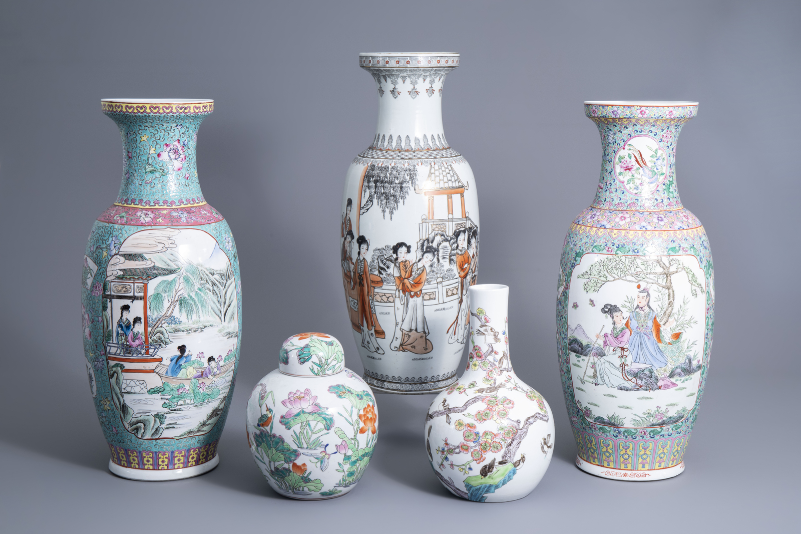 Four various Chinese famille rose and grisaille vases and a jar and cover with birds among flowering