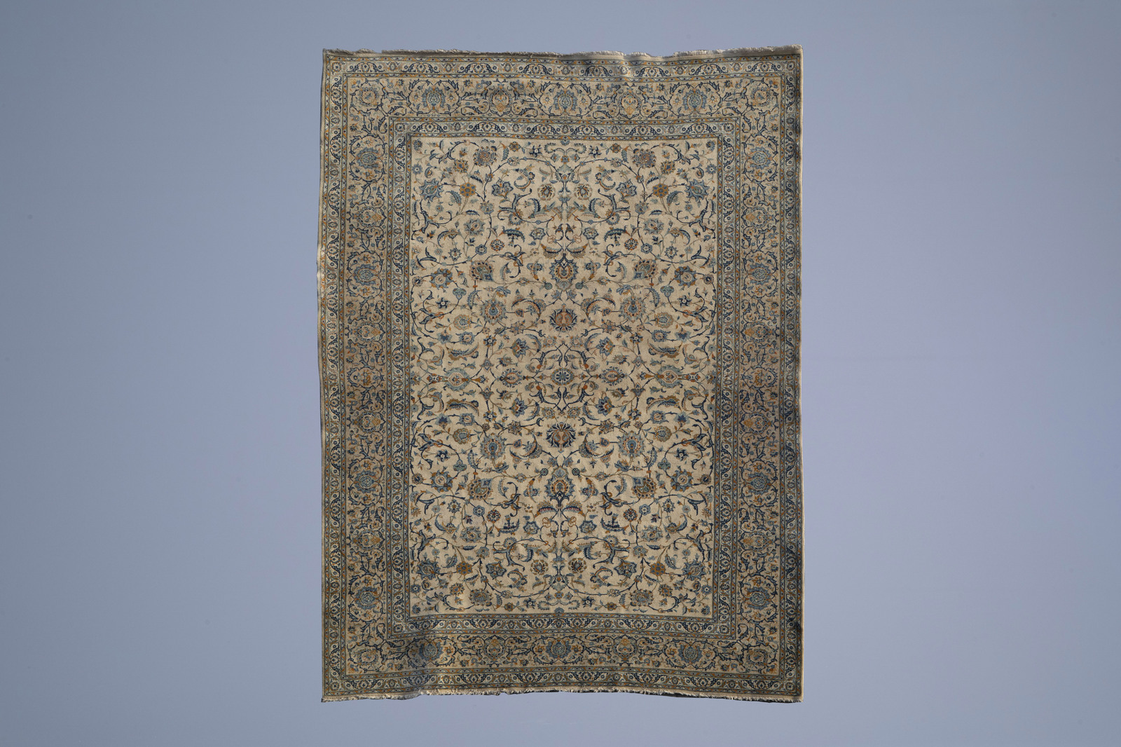 A large Oriental rug with floral design, wool on cotton, 20th C.