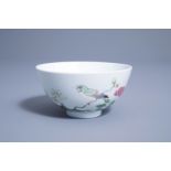 A Chinese famille rose bowl with a bird on a blossoming branch, Yongzheng mark, 19th/20th C.