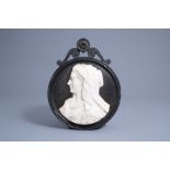 An Italian or Parisian alto relievo marble portrait plaque depicting probably a Vestal Virgin, 17th