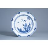 A large Chinese octagonal blue and white charger with a bird on a blossoming branch, Qianlong