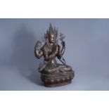 A red copper alloy figure of Avalokiteshvara, Tibet, 19th/20th C.