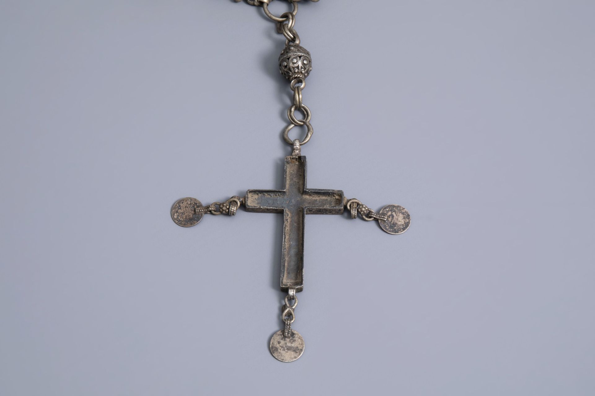 A varied collection of partly silver religious necklaces and crosses, various origins, 19th/20th C. - Image 8 of 12