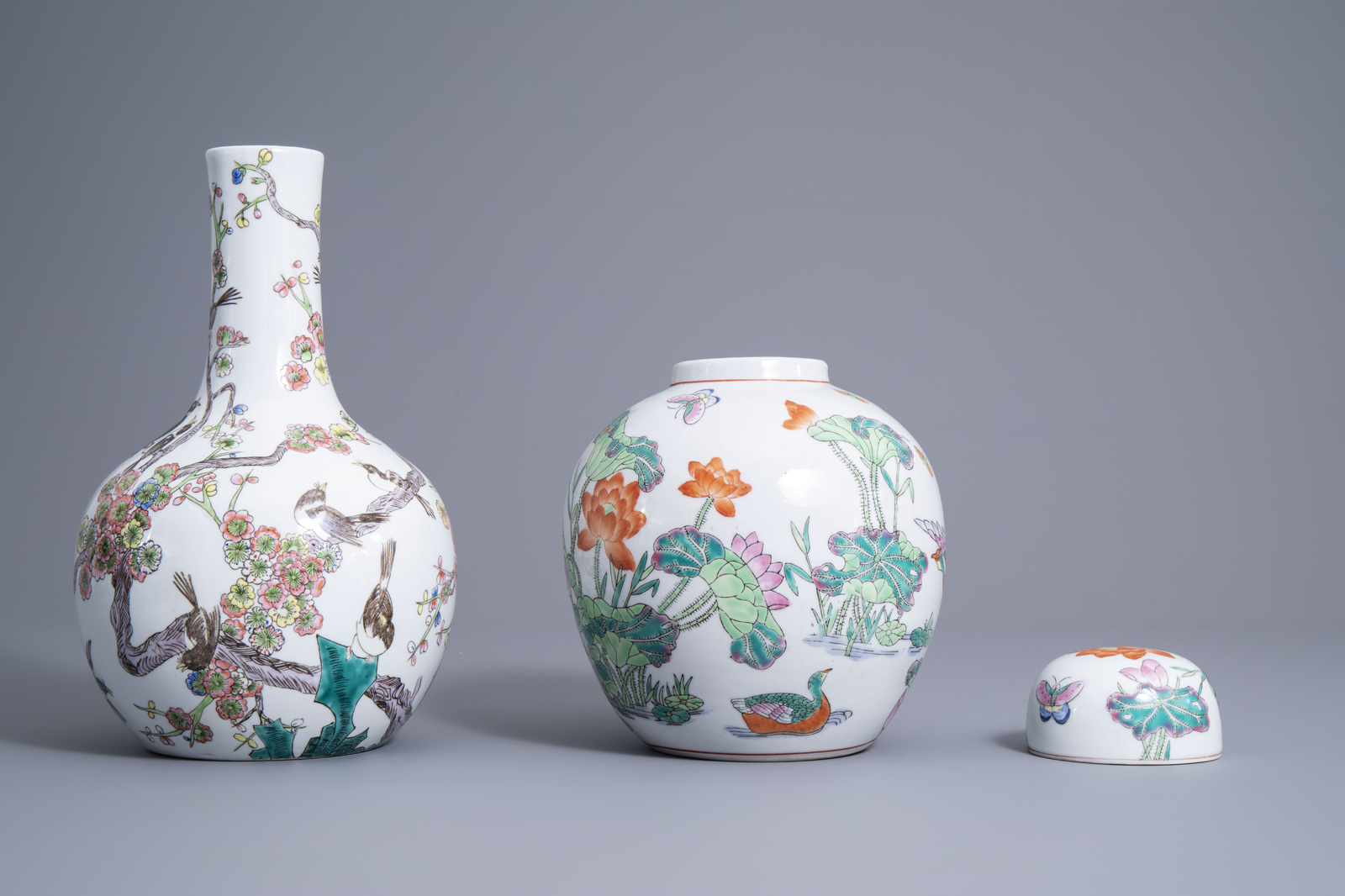 Four various Chinese famille rose and grisaille vases and a jar and cover with birds among flowering - Image 9 of 13