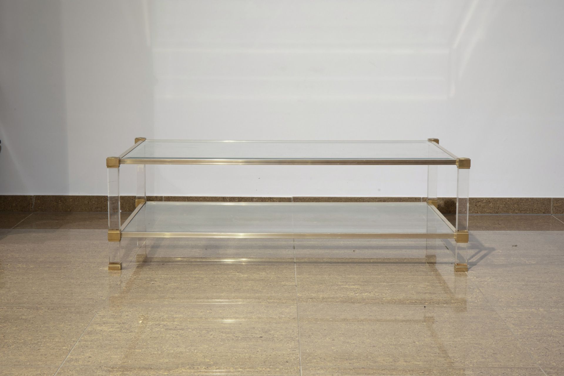 A Pierre Vandel brass and bevelled glass coffee table with lucite legs, France, 1970's - Image 2 of 7