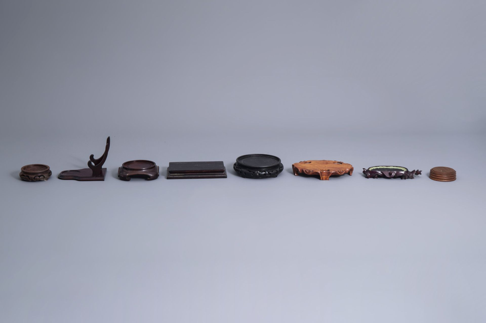 A collection of Chinese wooden stands, 19th/20th C. - Image 16 of 23