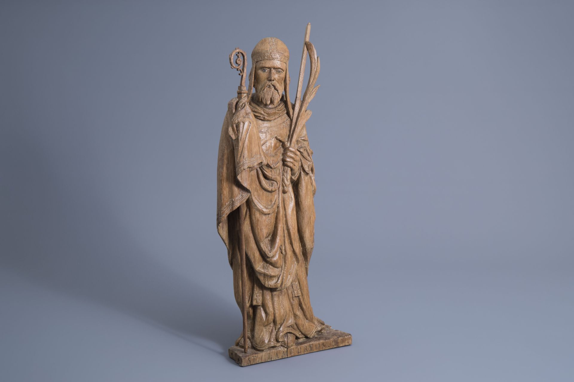 A carved wooden figure of Saint Lambert, Southern Netherlands, Flanders, 16th C.