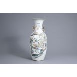 A Chinese famille rose vase with figures in a landscape, 19th/20th C.