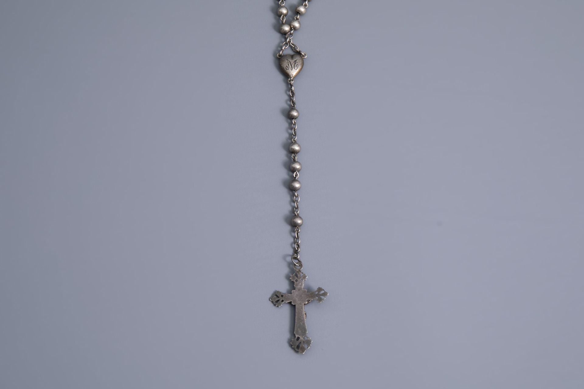 A varied collection of partly silver religious necklaces and crosses, various origins, 19th/20th C. - Image 12 of 12