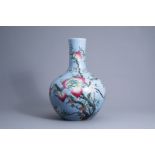 A Chinese blue ground famille rose 'nine peaches' vase, Qianlong mark, 19th/20th C.