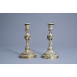 A pair of French Neoclassical bronze candlesticks with acanthus leaves and garlands, 18th C.