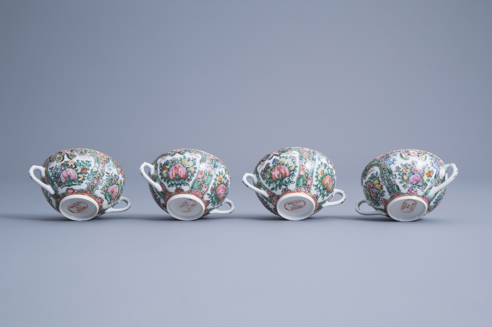 Four Chinese Canton famille rose cups, five saucers, two spoons and a wooden tray with inlay, 20th C - Image 10 of 17