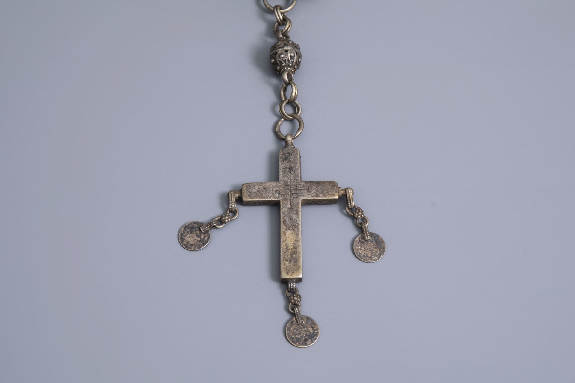 A varied collection of partly silver religious necklaces and crosses, various origins, 19th/20th C. - Image 7 of 12