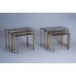 Two sets of three Maison Jansen rectangular gigogne side tables with a glass top, France, 1970's