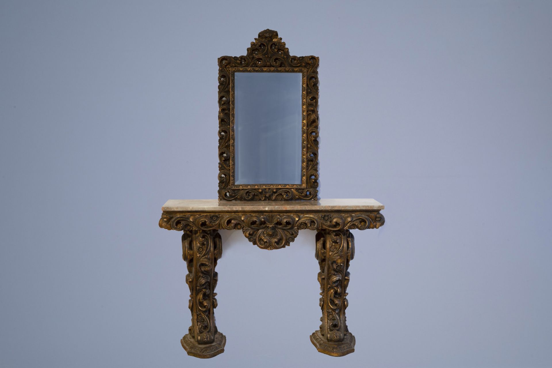 A Portuguese wooden wall console with marble top and matching Louis XV style mirror, 20th C.