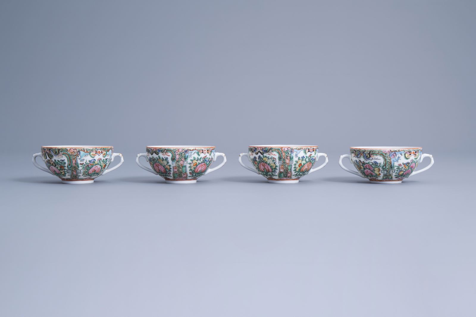 Four Chinese Canton famille rose cups, five saucers, two spoons and a wooden tray with inlay, 20th C - Image 6 of 17