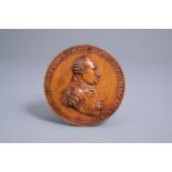 A palmwood medallion with the profile portret of Prince Frederick Josias of Saxe-Coburg-Saalfeld and