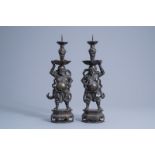 A pair of Chinese inlaid bronze candlesticks, 18th/19th C.