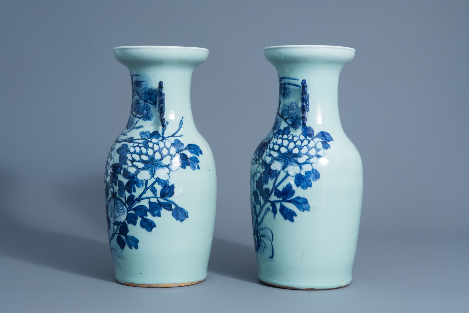 A pair of Chinese blue and white celadon vases with cranes on a rock, 19th C. - Image 4 of 6