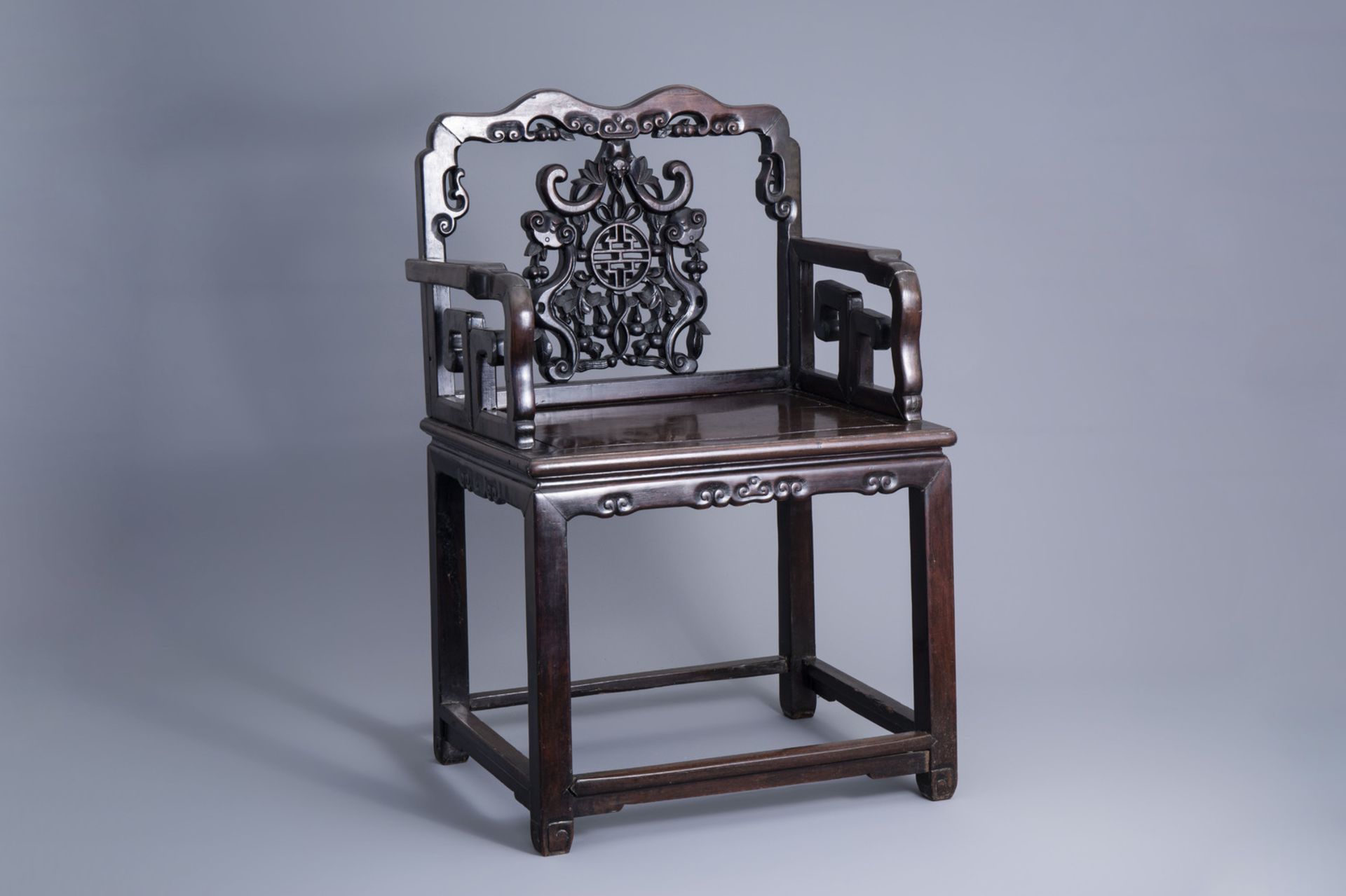 A Chinese wooden chair, 19th C.