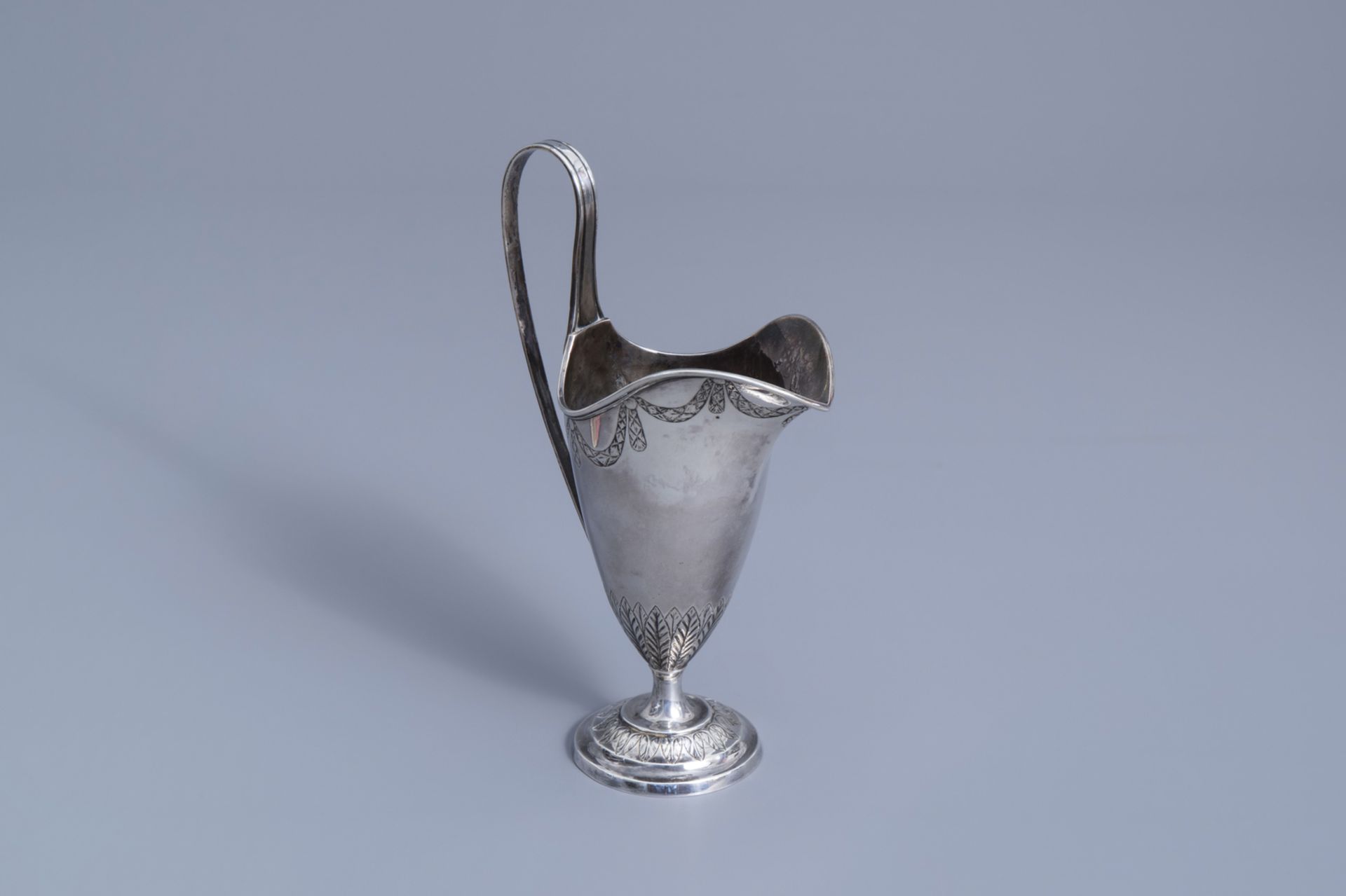A French Neoclassic silver jug, maker's mark V with a flower, 18th/19th C.
