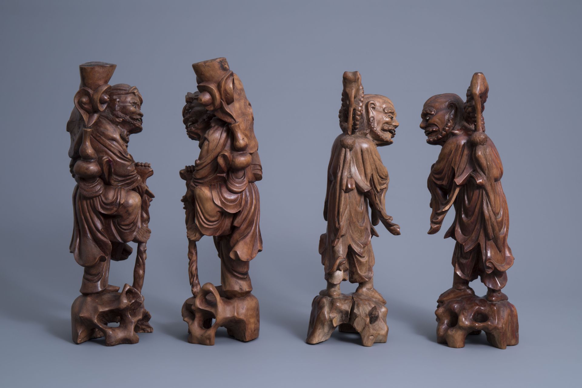 Four Chinese carved wooden figures of immortals, 19th/20th C. - Image 3 of 7