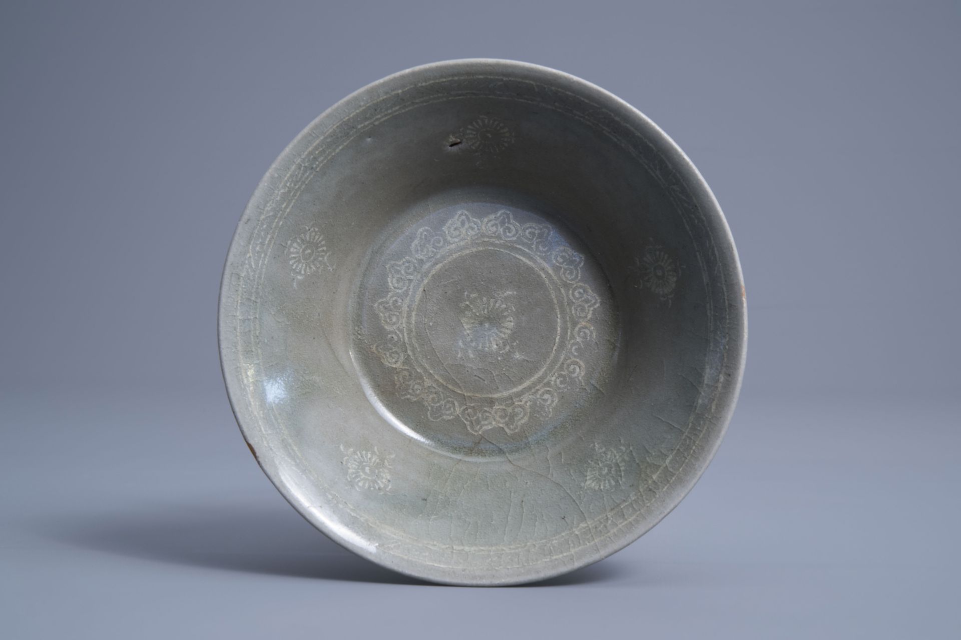 A Korean celadon bowl with ornamental design, probably Goryeo/Joseon, 14th/15th C.
