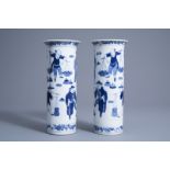 A pair of Chinese blue and white sleeve vases with figures, Kangxi mark, 19th C.