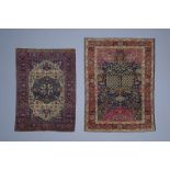 Two Oriental rugs with floral design, wool and silk on cotton, 20th C.