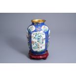 A Chinese gilt bronze mounted powder blue ground famille verte jar, 19th C.