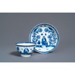 A Chinese blue and white 'mother and child' cup and saucer, Kangxi