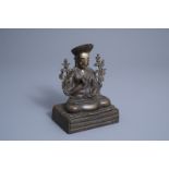 A Sino-Tibetan gilt bronze figure of a Lama, 19th/20th C.