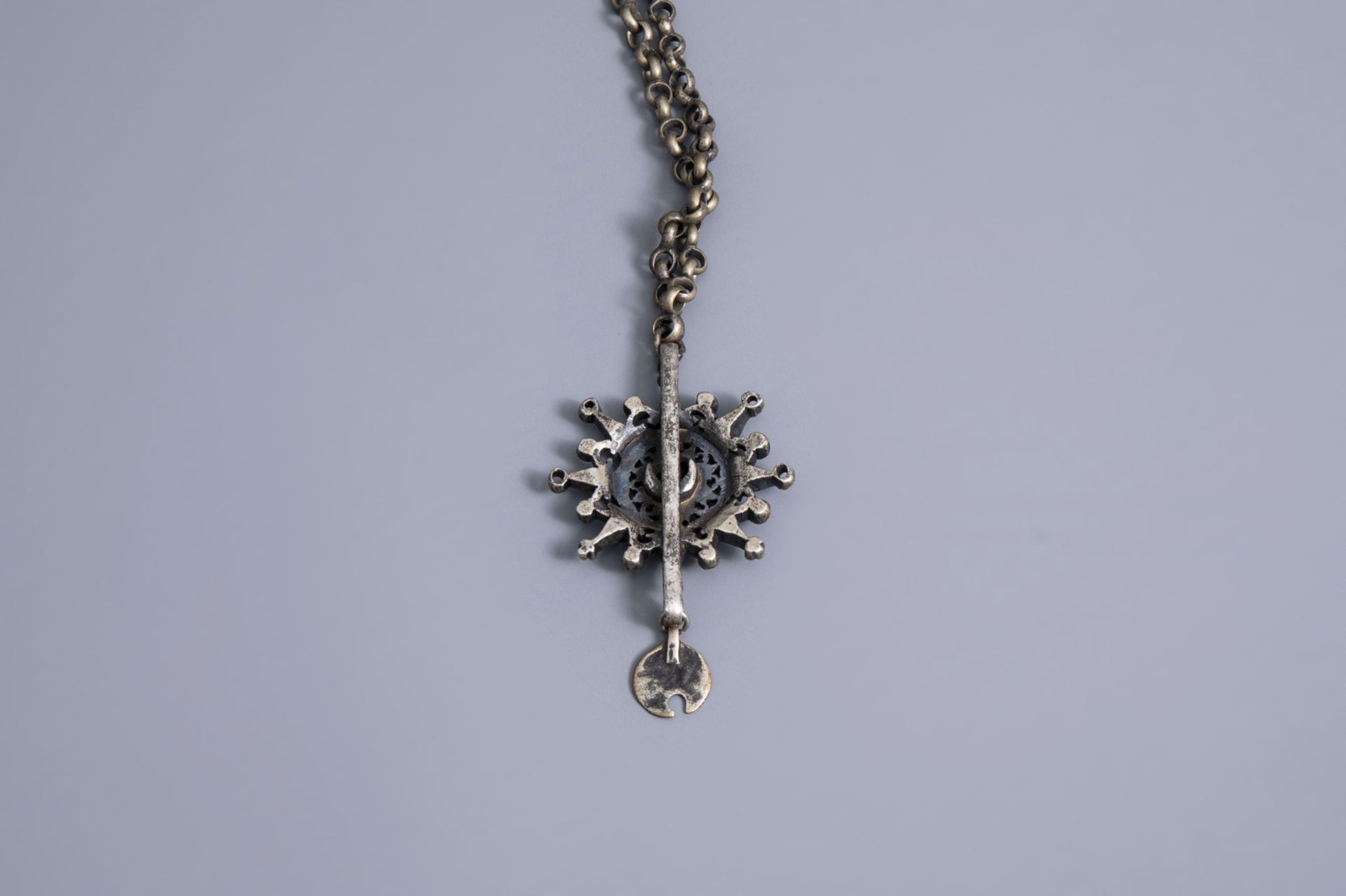 A varied collection of partly silver religious necklaces and crosses, various origins, 19th/20th C. - Image 10 of 12