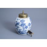 A Chinese blue and white 'Three friends of winter' jar mounted as a table fountain, Kangxi