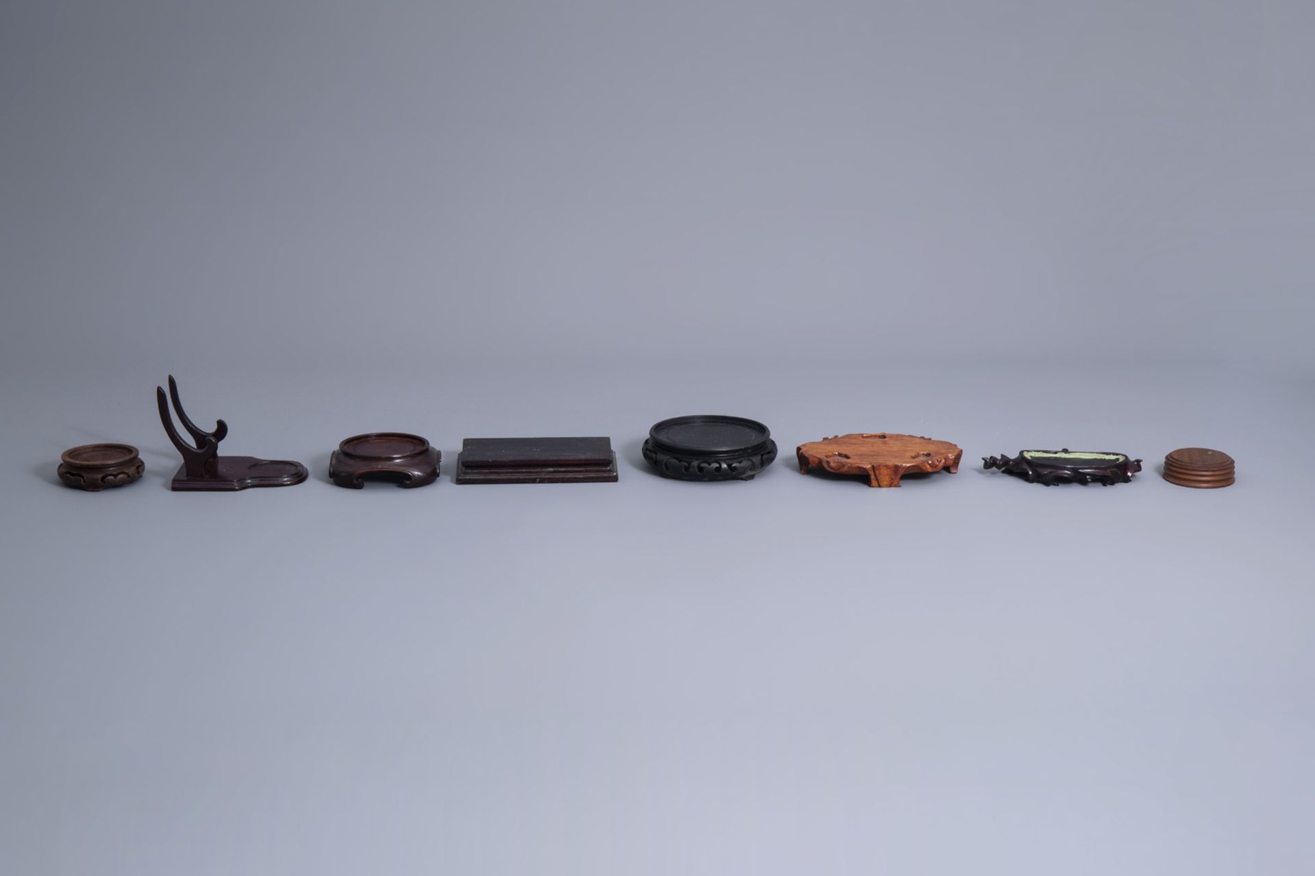 A collection of Chinese wooden stands, 19th/20th C. - Image 14 of 23