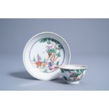 A Chinese famille rose 'Cherry Pickers' cup and saucer, Qianlong