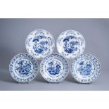 Five Dutch Delft blue and white chargers with floral design, 18th C.