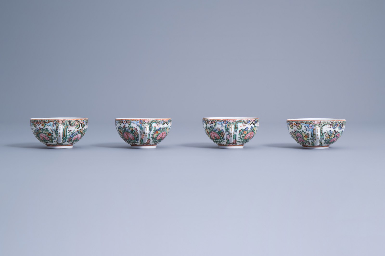 Four Chinese Canton famille rose cups, five saucers, two spoons and a wooden tray with inlay, 20th C - Image 7 of 17
