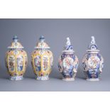Two pairs of polychrome Dutch Delft vases and covers, 19th C.